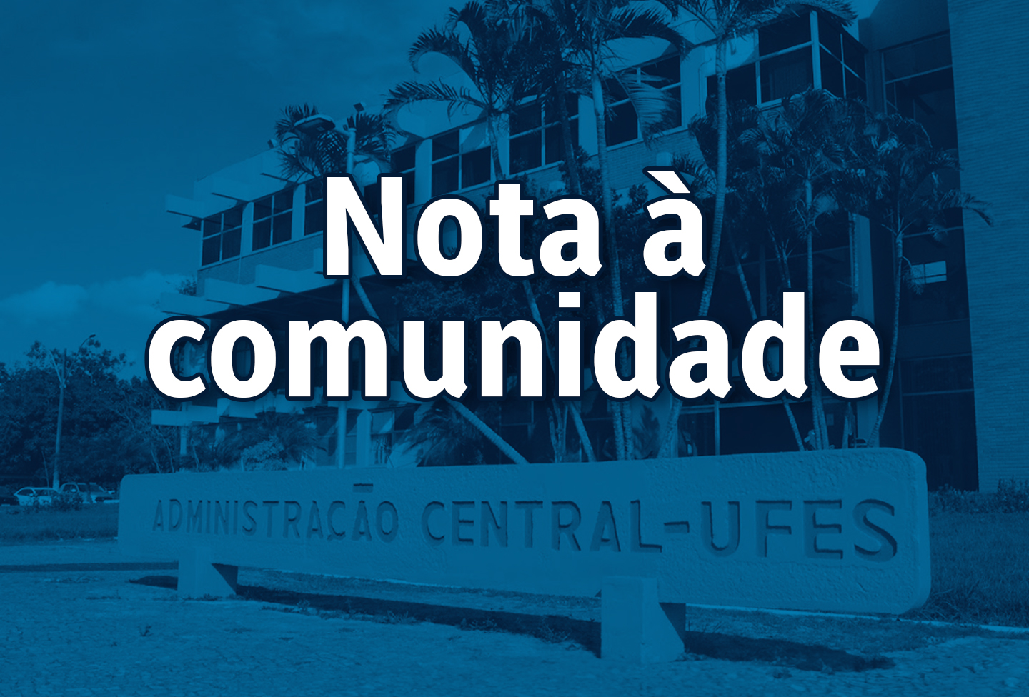 Imagem retangular em tons de azul escuro com o texto Nota à comunidade escrito em branco