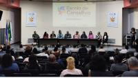Foto do auditório com os participantes do evento