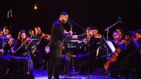 Foto da orquestra em uma apresentação